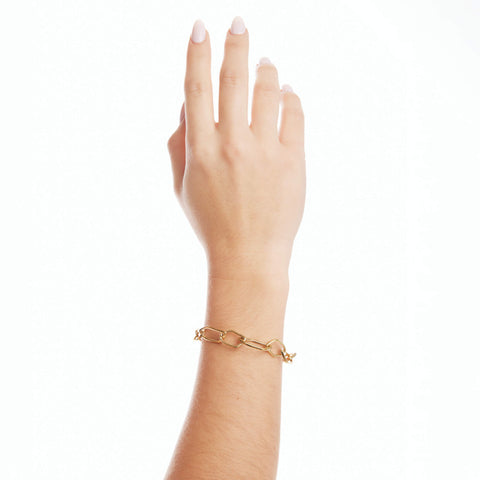 Dusk women's bracelet by Five Jwlry, from Alicia Moffet's collaboration. Features a series of rings with a fluid, organic design, including a bespoke clasp integrated into one of the rings for a unique allure. Available in 14k gold or silver, crafted from water-resistant 316L stainless steel. Hypoallergenic with a 2-year warranty.