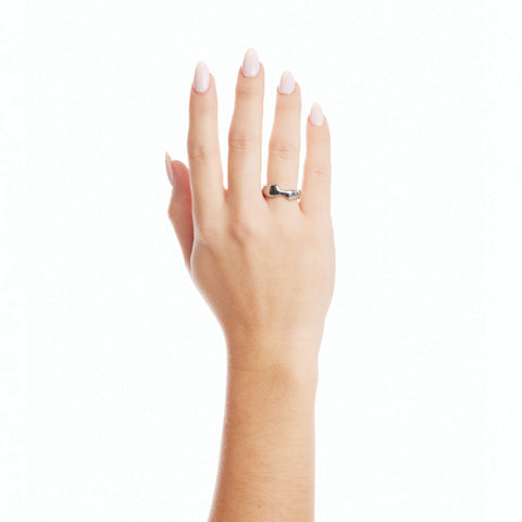 Dawn women's ring by Five Jwlry, a collaboration with Alicia Moffet, blending classic band style with the fluid elegance of a water droplet. Available in 14k gold or silver, this unique piece is crafted from water-resistant 316L stainless steel. Hypoallergenic with a 2-year warranty.