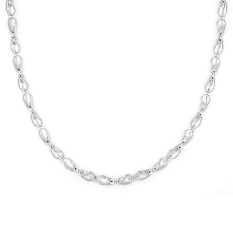 Dawn women's necklace by Five Jwlry, a unique creation from Alicia Moffet's collaboration. Inspired by the purity of a water droplet, this custom-molded links piece is adjustable to 40cm or 45cm. Available in 14k gold or silver, made from water-resistant 316L stainless steel. Hypoallergenic with a 2-year warranty.