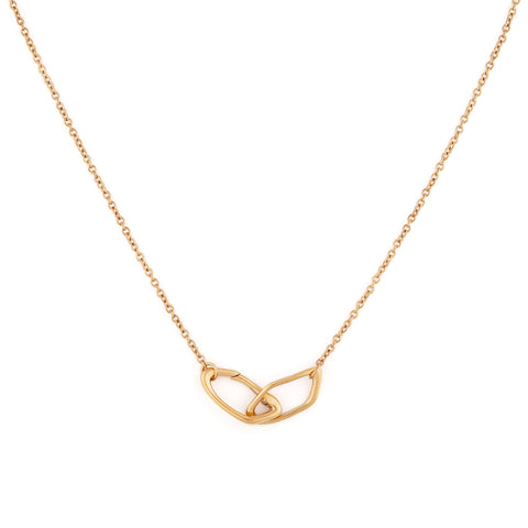 Dusk women's necklace by Five Jwlry, part of Alicia Moffet's collaboration. The necklace showcases a pendant with two organically crisscrossed hoops, cleverly incorporating the clasp. Paired with a fine 2mm cable chain, available in 14k gold or silver, crafted from water-resistant 316L stainless steel. Hypoallergenic with a 2-year warranty.
